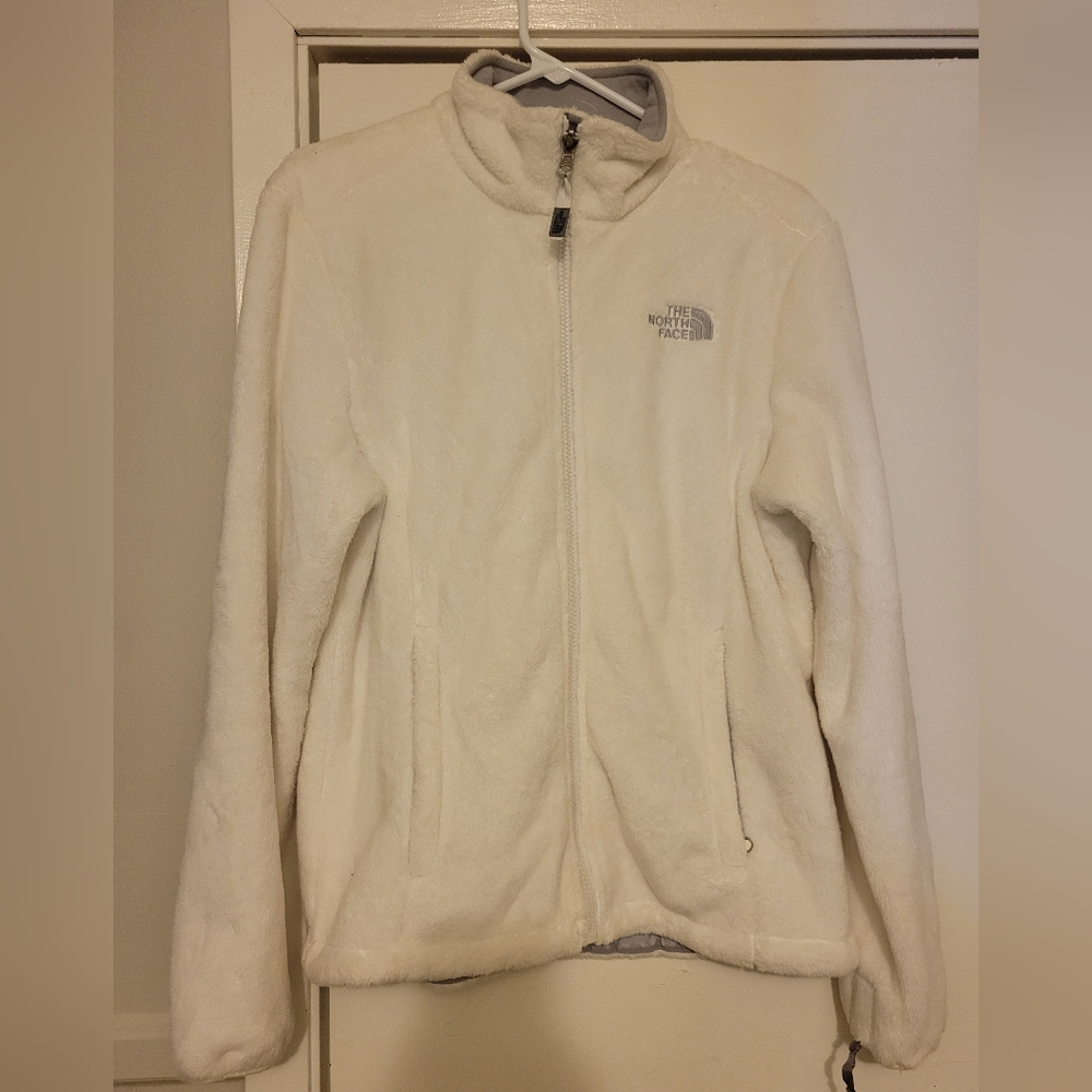White plush The North Face jacket.